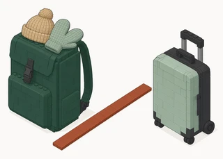 A dark green backpack with a knit hat and a pair of mittens on top, a light green wheeled suitcase with its handle up, and a red strip on the floor between them.