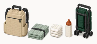 A tan diaper backpack beside a folded sage changing mat, a small stack of white diapers, a baby bottle with a terracotta cap, and a folded green stroller.